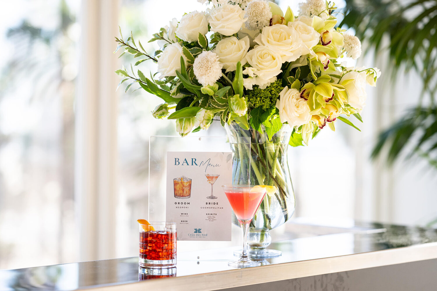 custom wedding cocktail menu of a cosmopolitan and negroni