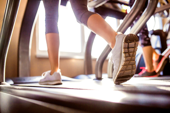 shot of a person's legs walking on a treadmill