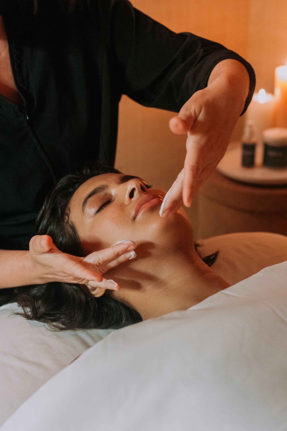 woman getting a facial at the spa